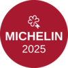 Michelin-Stern-Logo 2025 auf rotem rundem Hintergrund