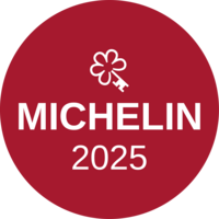 Michelin-Stern-Logo 2025 auf rotem rundem Hintergrund