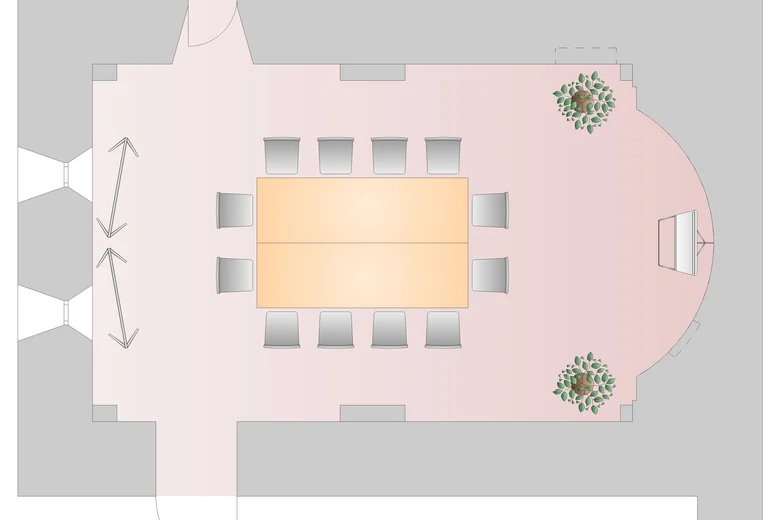Grundriss eines Konferenzraums mit Tisch, 12 Stühlen und Pflanzen