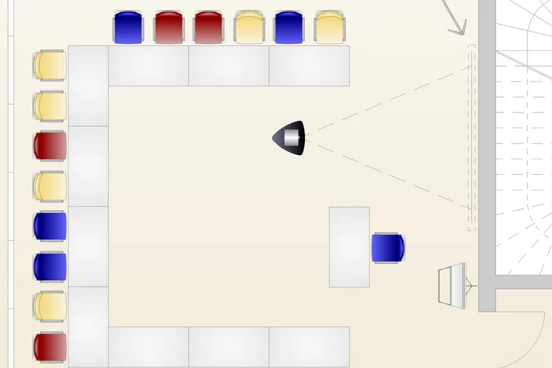 Grundriss eines Raums mit U-förmiger Sitzanordnung und zentralem Präsentationsbereich